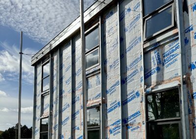 A wide angle of steel window with the rap of papers