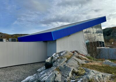 A blue wide view of steel building