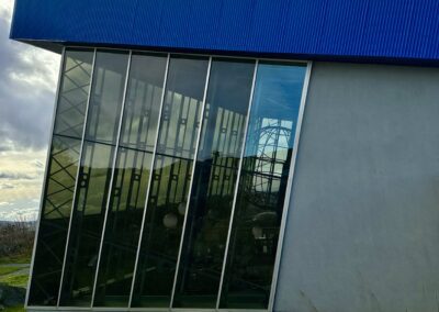 A blue color side window of building view