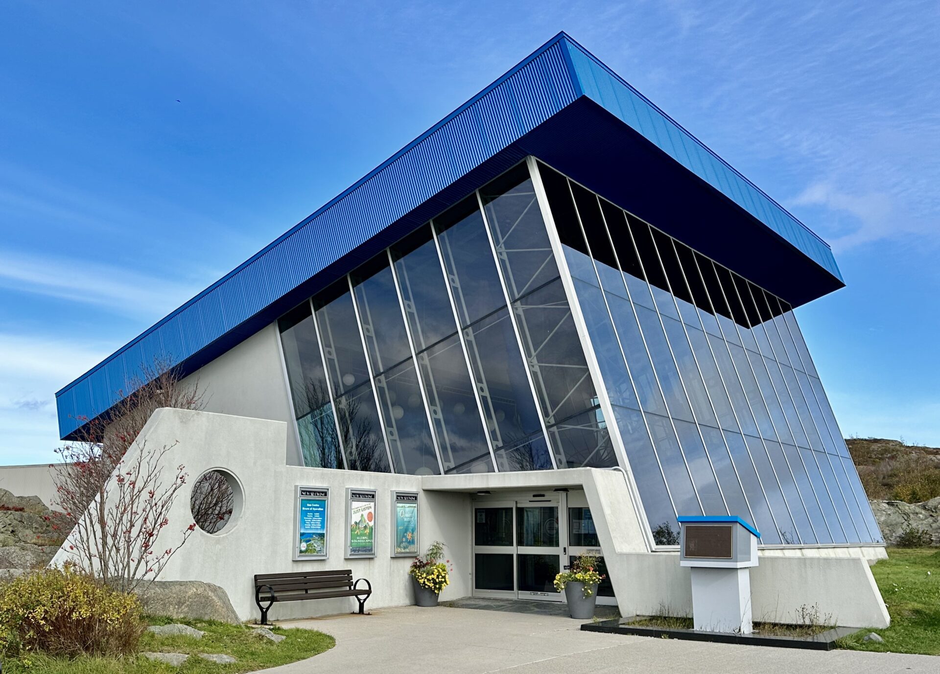 A grey & red color building front view